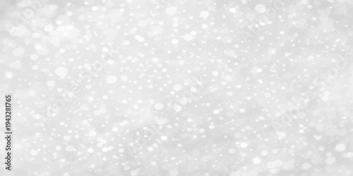 Abstract blue Christmas winter background with falling snowflakes and shiny stars featuring a bokeh light design and cold ice texture for holiday season decoration