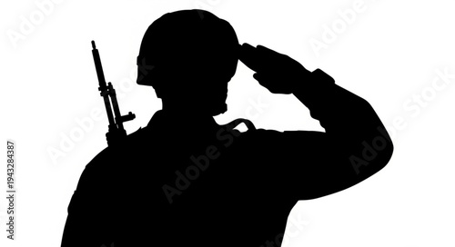 Silhouette of Soldier Saluting with Rifle.