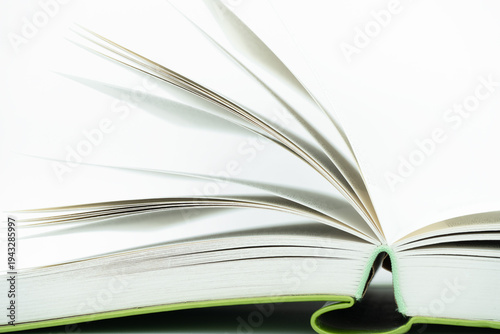 Open Book with Turning Pages on White Background