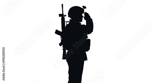 Silhouetted Soldier with Rifle Standing.