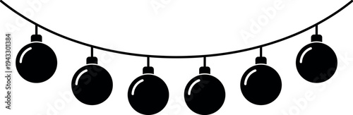 Christmas garland with hanging black ornaments and decorative baubles on a curved string for holiday season greeting cards and winter party invitations