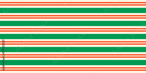 Christmas seamless pattern. Red and green diagonal stripes background. Candy cane repeating decoration wallpaper. Winter holiday lines backdrop. vector