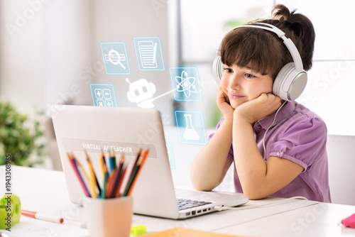 Foto Primary school student using a laptop with virtual AI assistant icons for person