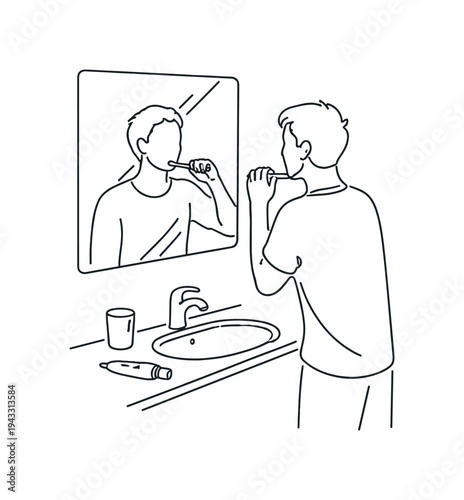 истка зубов. Person standing at a bathroom sink brushing teeth with a toothbrush, mirror mounted above the basin, small cup and