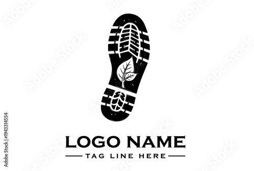 Black and white logo design featuring a shoe print with a leaf on a clean white background for eco-friendly brand identity.