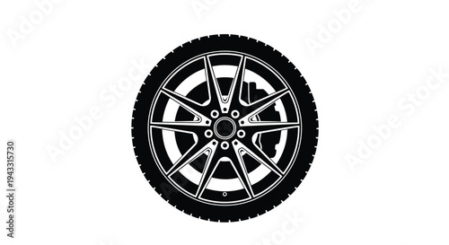 Black and white illustration of a modern car wheel with brake components