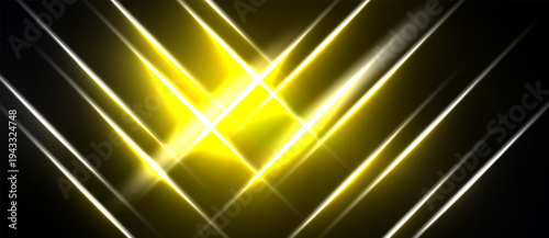 Bright yellow light beams converge. Dark background creates dramatic effect. Abstract design suggests energy, power, motion.