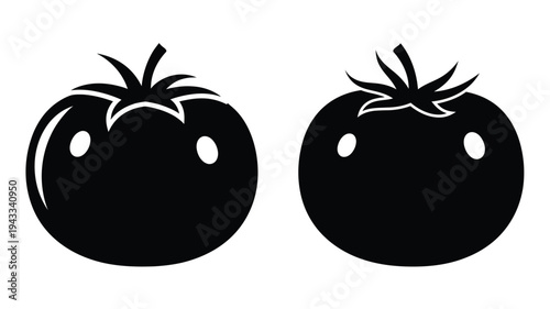 Two black tomato shapes offer a striking visual silhouette