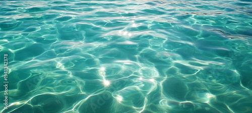 Serene Turquoise Calm Liquid Ripple Surface Backdrop with Sparkling Reflections of the Sea