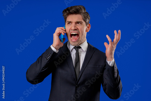 Businessman Screaming On Mobile Phone. Man Dispute, Arguing, Expressing Negative