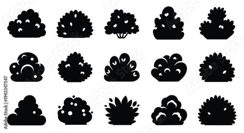 Collection of black shrub and tree shapes in a flat silhouette