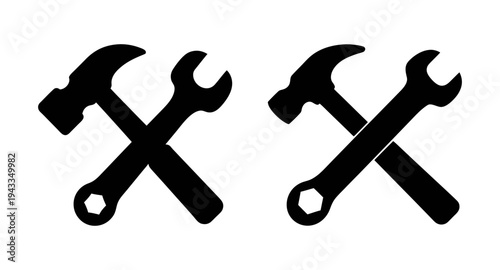 Hammer and wrench crossed tools vector icon for repair construction maintenance service work design