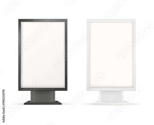 Two blank advertising city light signs. Empty vertical billboards presenting space for outdoor digital marketing messages
