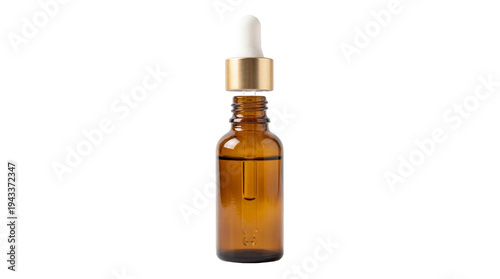 Photos Amber glass dropper bottle, partially open, with golden cap and white pipette, c