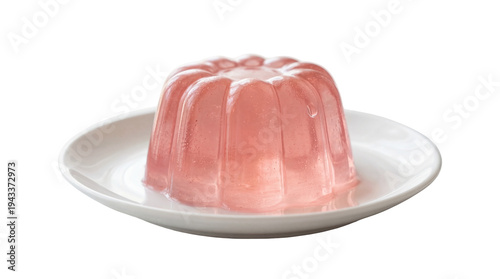 Foto Sweet pink gelatin dessert, wobbly and translucent with a fluted shape, served o