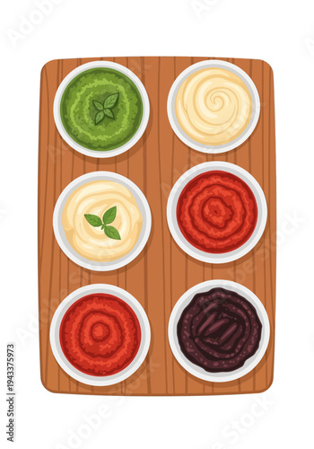 Colorful dips in small bowls on wooden board.