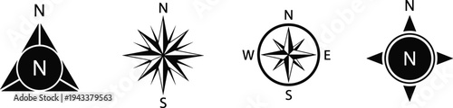 Four different compass rose symbols