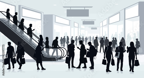 Silhouettes of business people in a modern building lobby with an escalator.