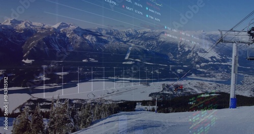 Framing snowy groomed slope showing lift pylon, cables at top of ski run, with digital charts