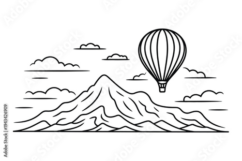 Hot air balloon above mountain and clouds, travel concept