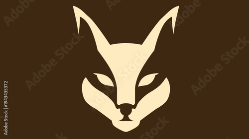 A symmetrical animal head design with sharp ears and piercing eyes, set against a dark background