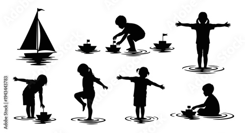Children playing with toy boats in shallow water silhouette