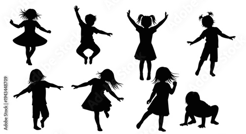 Children Silhouettes Dancing and Playing Outdoors