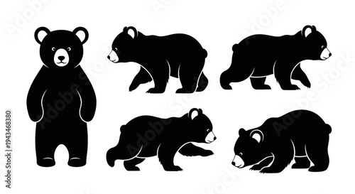 Set of Black Bear Cub Silhouettes in Various Poses on White Background