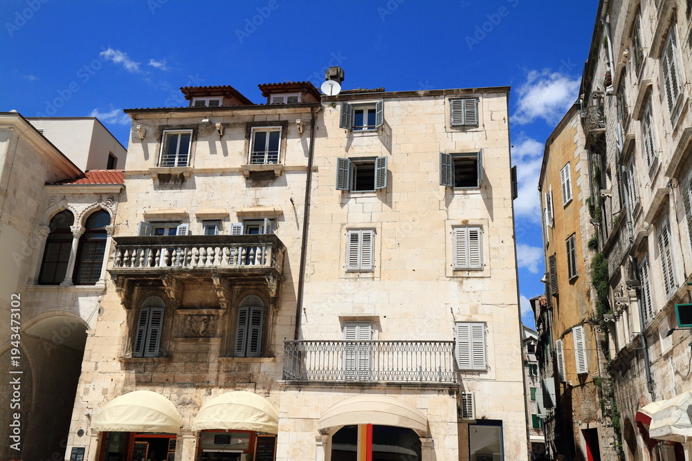 Fototapeta premium Historic Stone Building With Balcony Facade, Croatia