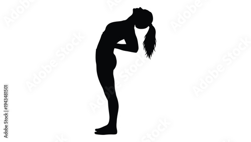 A woman in a yoga pose with her head down