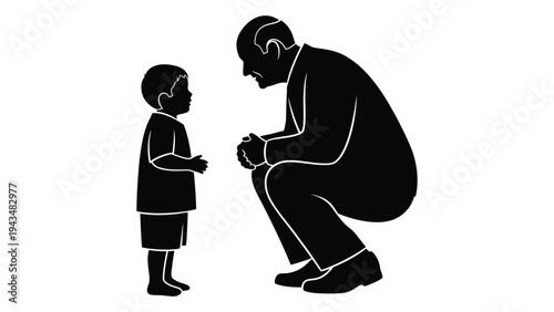 A man crouches down to talk to a young child