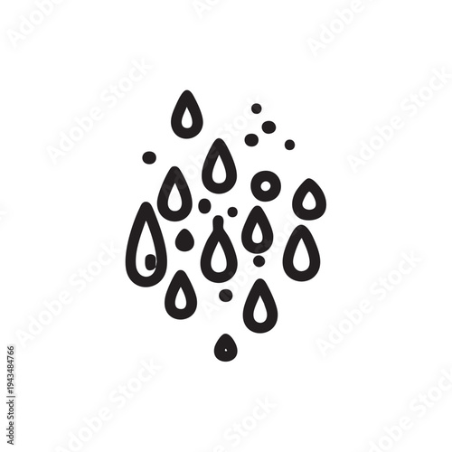 Rain drops fall on a clear window glass surface creating a beautiful pattern