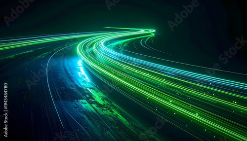 Abstract high-speed green and blue light trails on a dark background representing data flow and connectivity