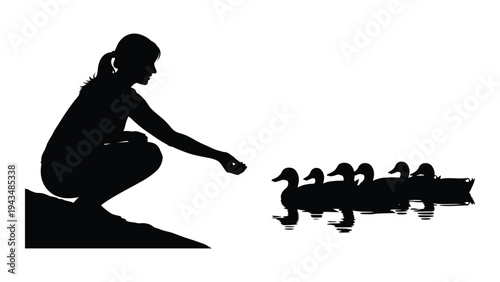 Woman feeding ducks by the water
