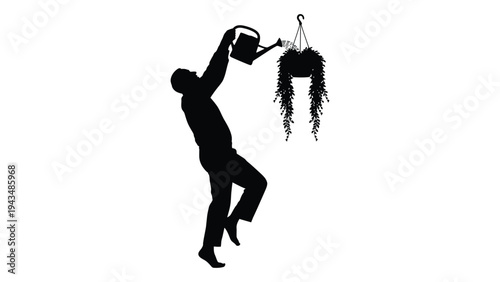 Man watering hanging plant