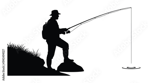 Man fishing on a rock by the water