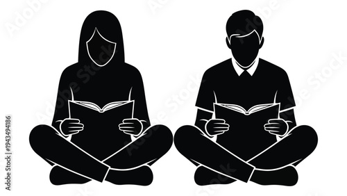 A man and a woman sitting cross-legged and reading books