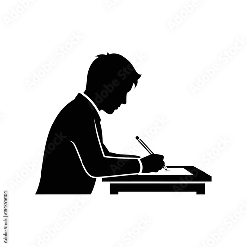 Man sitting at desk writing documents.