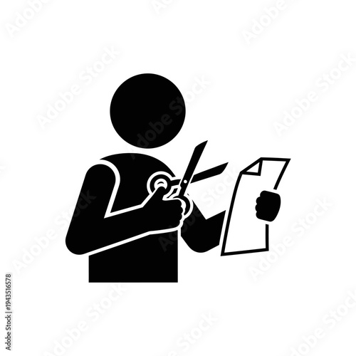 Person cutting paper with scissors.