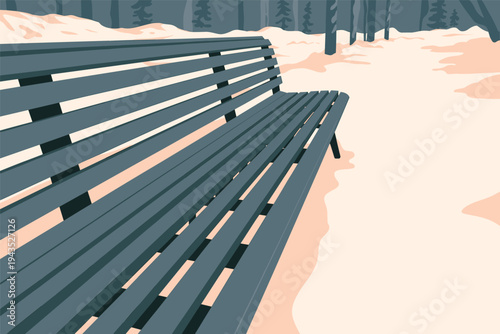 Empty park bench in peaceful snowy winter landscape.