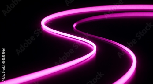 Vibrant pink neon light trail glowing in darkness, abstract background