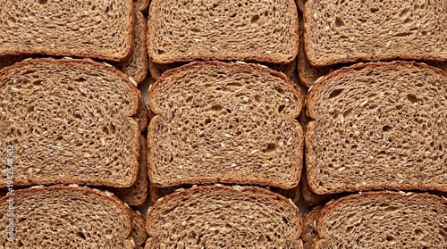 Top View of Whole Wheat Bread Slices – Healthy Whole Grain Bakery Texture with Seeds and Fiber, Ideal for Breakfast, Sandwiches, and Clean Eating Nutrition Background