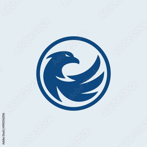 a silhouette of a majestic eagle in a circle logo