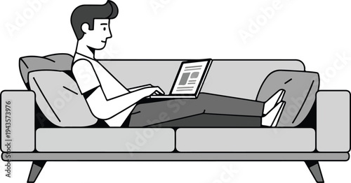 A person reclines on a gray couch using a laptop They are wearing a white shirt and gray pants