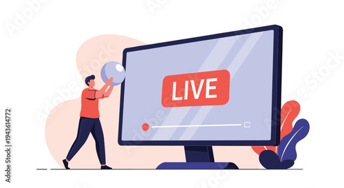 Creative professional man standing next to a large computer monitor and setting up a live video broadcast for an online audience.