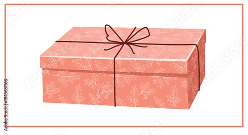 Pink gift box wrapped in textured paper is tied with a simple brown twine cord and bow for a rustic present look.