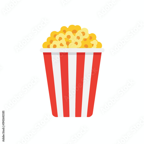 A striped red and white container overflows with fluffy yellow popcorn