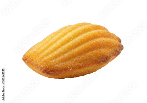 Golden brown madeleine cookie with distinct shell ridges and delicate texture isolated on white background