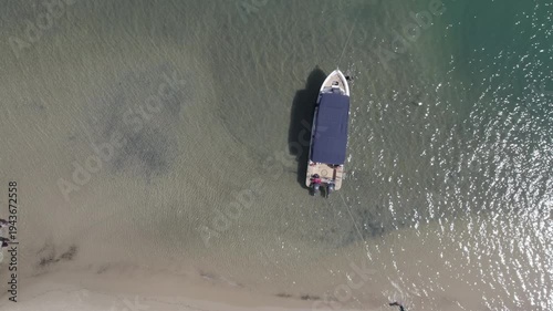 Boat anchored off tropical beach in South America - Aerial view