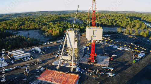 Lifting maneuver process of large pre-assembled steel structures with a lattice crane